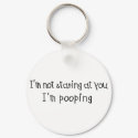 Not Staring I'm Pooping keychains