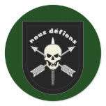 nous defions round sticker
