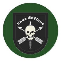 nous defions round sticker