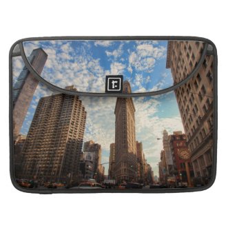 NYC's Flatiron Building, Wide View, Puffy Clouds Sleeve For MacBooks