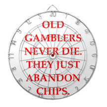 old gambler dartboard with darts