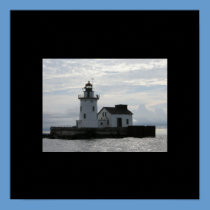 Old Lighthouse on cloudy day posters