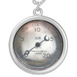 Old pressure gauge from a vintage racing car necklaces