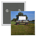 Old Tractor Trailer on a Green Field Pins