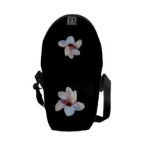 One Magnolia Blossom messenger bags