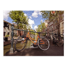 Orange bike in Amsterdam Netherlands Postcard
