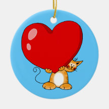 Orange cat carrying a big red heart ornaments
