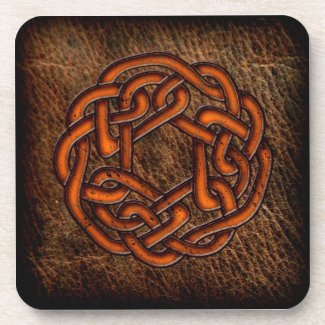 Orange celtic knot on leather drink coaster