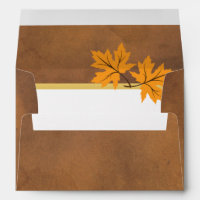 Orange maple leaves on brown rustic beach wedding envelope