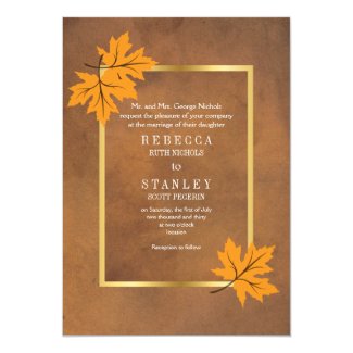 Orange maple leaves on brown stained paper wedding