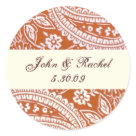 round_sticker - Orange paisley, with the bride and grooms name, and wedding date.