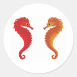 orange seahorses round sticker