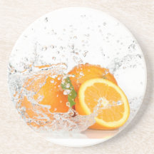 Oranges with water splashing drink coaster