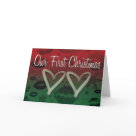 postcard - Two hearts with "Our First Christmas" greeting - lips and snowflakes burned in the background.  Customize any way you like inside
