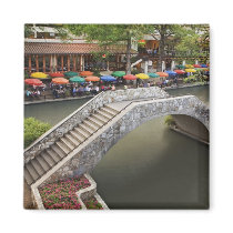Outdoor cafe along River Walk and bridge over 2 Refrigerator Magnet