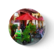 Outdoor Cafe With Red Umbrellas buttons