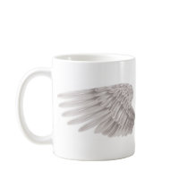outstretched beautiful white wings coffee mug