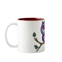 Owl perched on a branch mugs