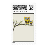 Owls couple on the tree. stamps