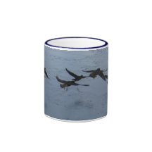 Oystercatchers in Flight Over the Water Mug
