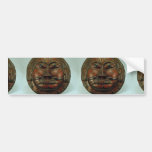 Painted shield showing face bumper stickers
