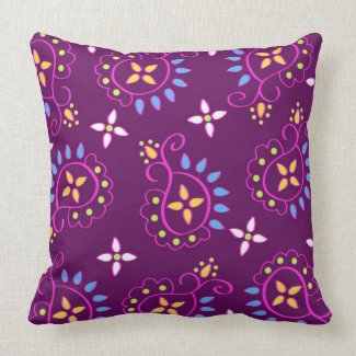 Paisley pattern on purple throw pillows