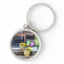 Pansies and Watering Cans on Steps keychains