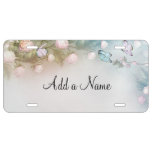 Pastel flowers and butterflies license plate