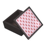 Pattern of nice red bows on pretty pink background premium jewelry boxes
