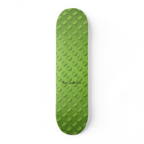 Pea green polka dots on green skateboards