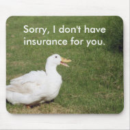 Pekin duck with open bill on green grass mousepad