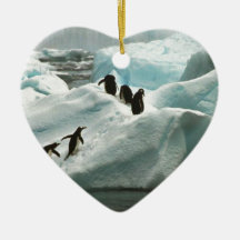 Penguins on a snow bank ornament