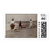 People having fun on the beach postage