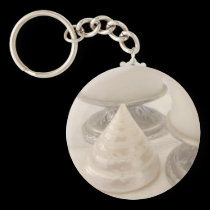 Pewter candlesticks and seashell keychain