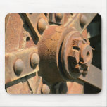Photo of rusty old tractor wheel hub and axle mousepads