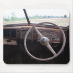 Photograph of old car interior with rusty gauges mousepads