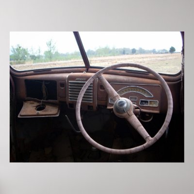 This product contains a photo of the inside of a rusty old car with cracked