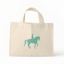 Piaffe Dressage Horse and Rider (teal) bags by dogsandhorses Piaffe Dressage Horse and Rider (teal) bags