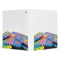 Pile of alphabet blocks binder