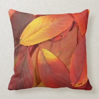 Pile of red autumn leaves closeup pillow