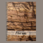 piled rocks notebooks
