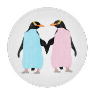 Pink and blue Penguins holding hands. Cutting Board