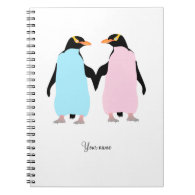 Pink and blue penguins holding hands. spiral note books