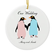 Pink and blue Penguins holding hands Round Ceramic Ornament