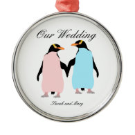Pink and blue Penguins holding hands. Silver-Colored Round Ornament