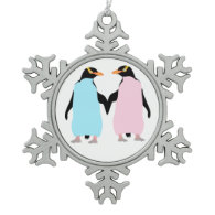 Pink and blue Penguins holding hands. Ornaments