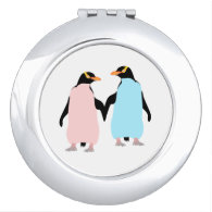 Pink and blue Penguins holding hands. Compact Mirrors