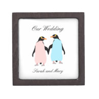 Pink and blue Penguins holding hands. Premium Keepsake Boxes