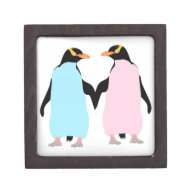 Pink and blue penguins holding hands. premium gift boxes