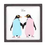 Pink and blue penguins holding hands. premium keepsake boxes
